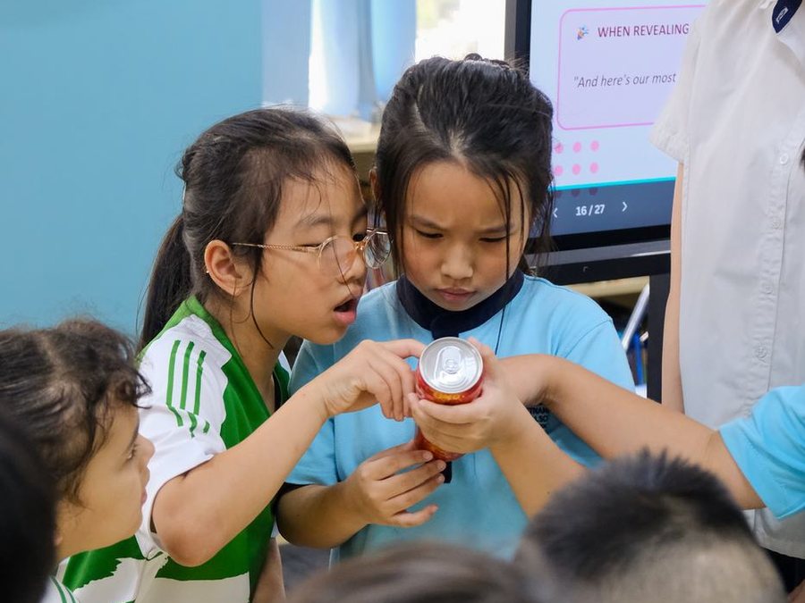 Students inspecting a product label